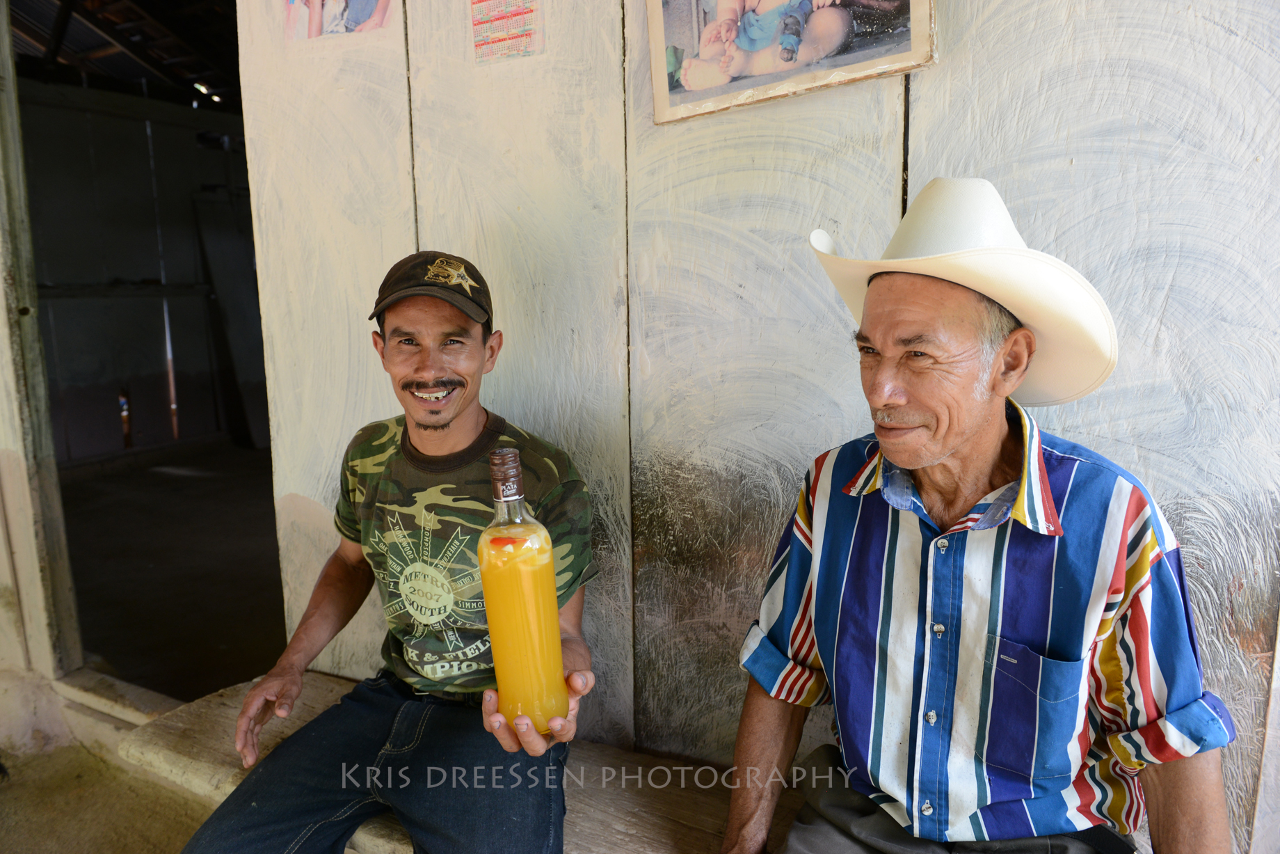 Alcides and his homemade bitter orange vinegar and Nicholas