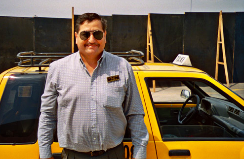 Cesar the first Friends Project recipient, with his taxi