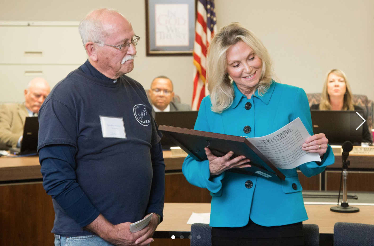 Tom Matthews and Connie Rocko, as they read the resolution/Photo by Keith Walters