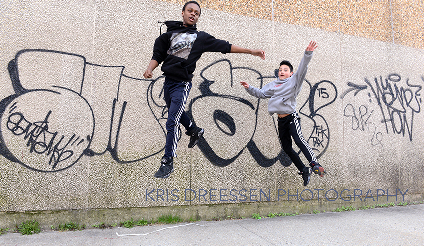 members of Cora dance jump off a wall